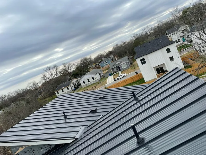Standing seam metal roof panels with vents for Skylight Repair in Bellair-Meadowbrook Terrace